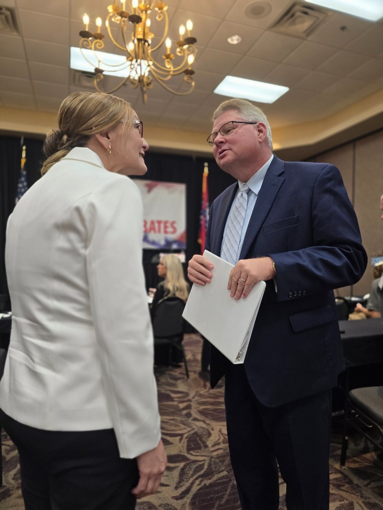 Kelly Grappe for Arkansas Secretary of State — talks with attendees at a community event Kelly Grappe, candidate for Arkansas Secretary of State, talks with attendees at a community event.