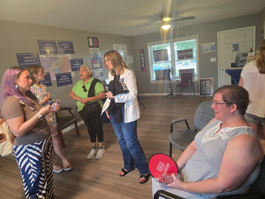 Kelly Grappe for Arkansas Secretary of State — talks with supporters inside a campaign office Kelly Grappe, candidate for Arkansas Secretary of State, talks with supporters inside a campaign office.