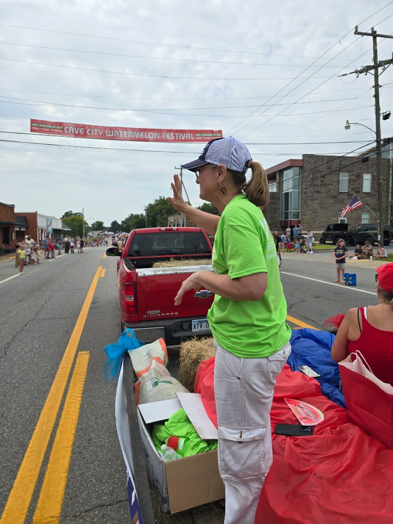 Kelly Grappe for Arkansas Secretary of State — campaign photo Kelly Grappe, candidate for Arkansas Secretary of State. Kelly Grappe waves from a parade trailer on Main Street at the Cave City Watermelon Festival in Sharp County.