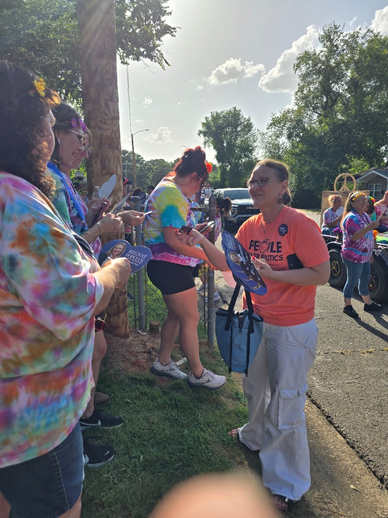 Kelly Grappe for Arkansas Secretary of State — walks a parade route with campaign fans Kelly Grappe, candidate for Arkansas Secretary of State, walks a parade route with campaign fans.