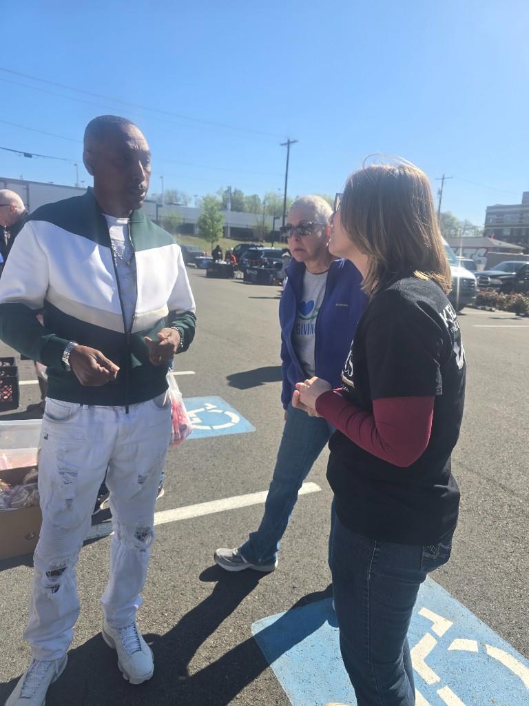 Kelly Grappe for Arkansas Secretary of State — talks with neighbors at a community stop Kelly Grappe, candidate for Arkansas Secretary of State, talks with neighbors at a community stop.